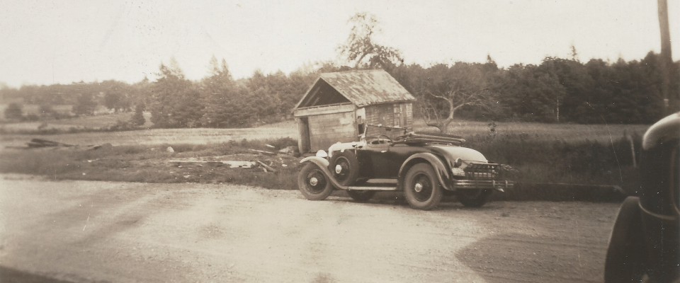 B/w photograph of car